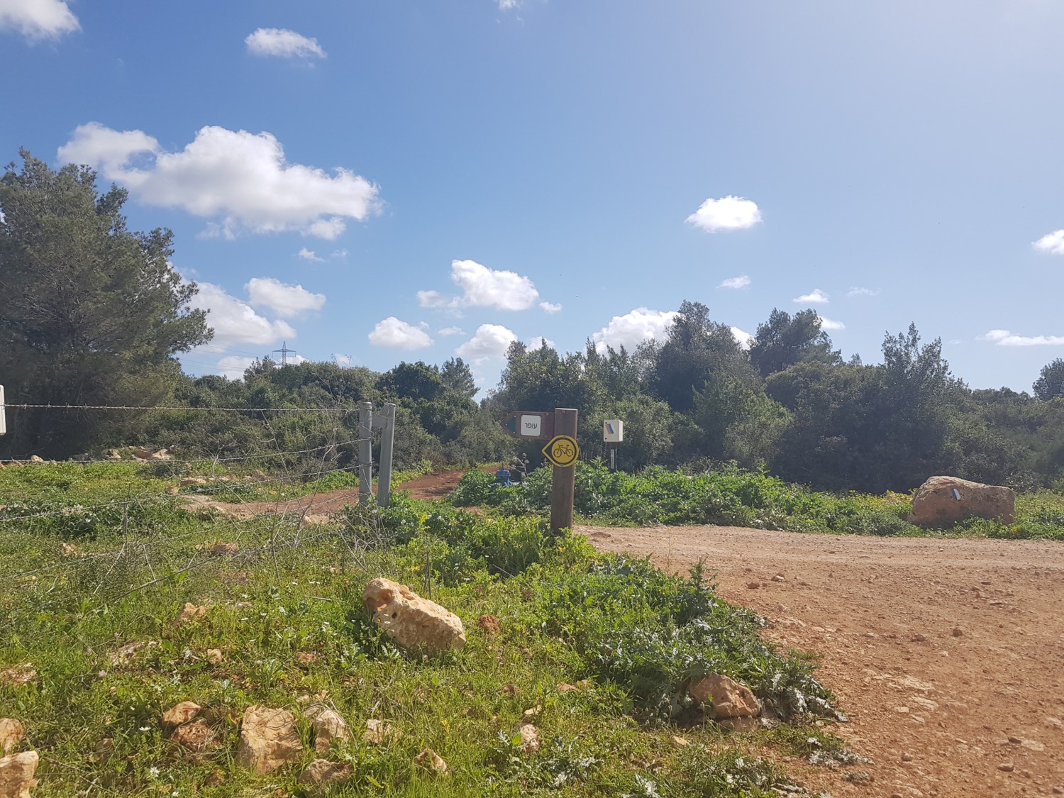 Pointing to Ofer and the Ramot Menashe Regional Trail